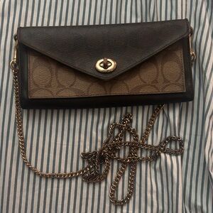 Coach Black and Tan Clutch with Gold Chain